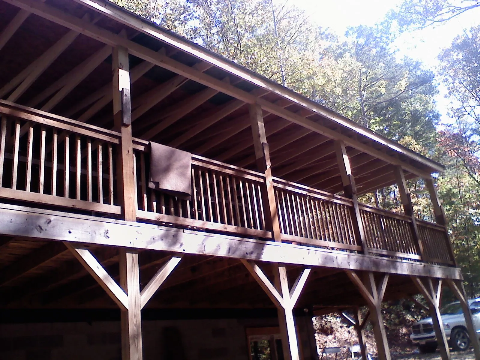 Timber framing under a new elevated porch and deck — Roof Leak Repair in Semora by Roofing Brothers